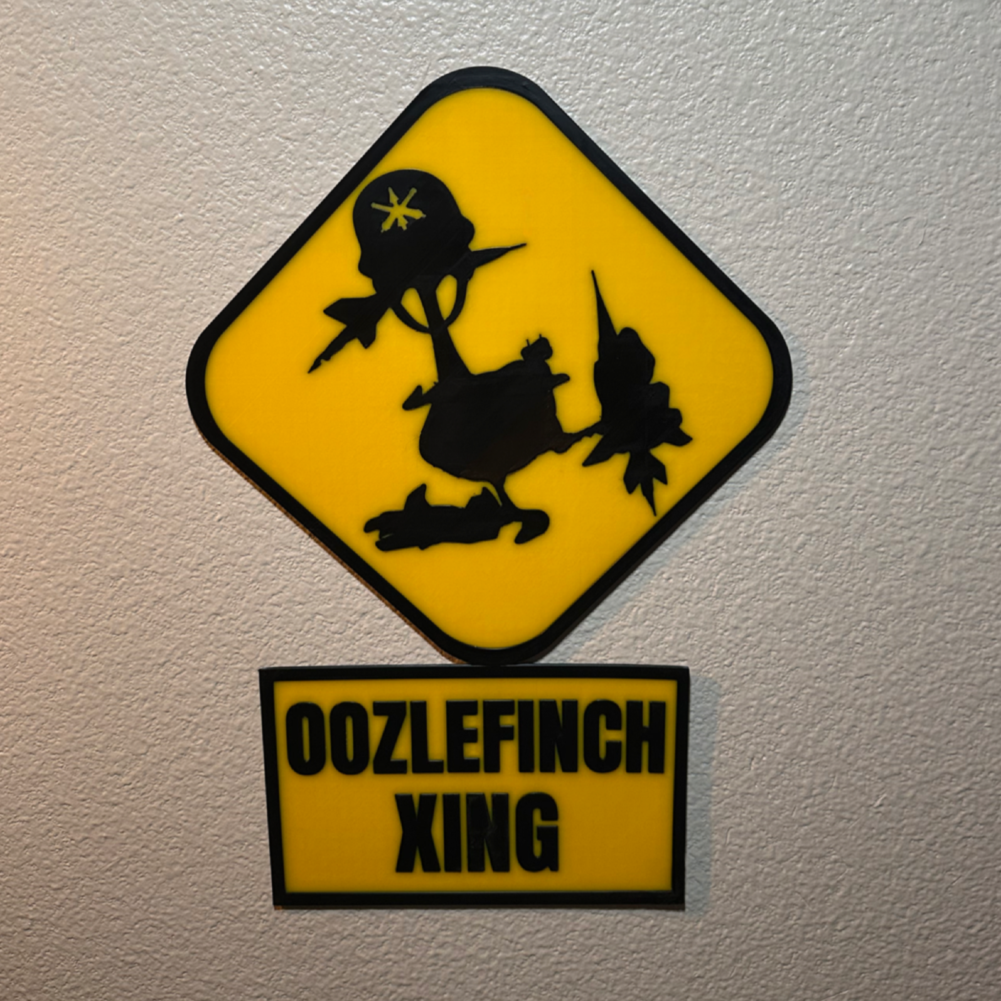 Oozlefinch Crossing Wall Sign | 2-Piece Air Defense Decor